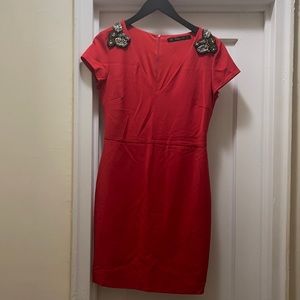 Beautiful sexy dress. Beautiful color. Wore once for dinner.